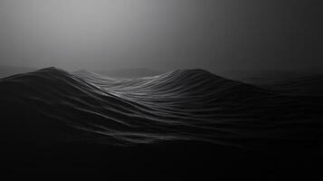 Dark ocean waves are creating rolling hills under a muted light, giving a sense of mystery and vastness photo