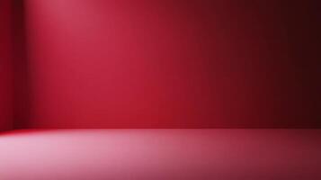 Light illuminating corner of empty room with red walls and floor, creating gradient effect photo