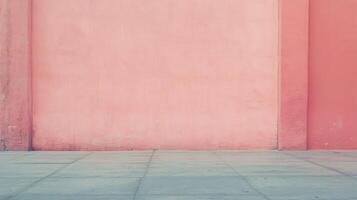 Minimalist urban background showing pink wall and gray tiled floor, creating an empty space photo