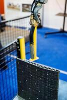 A highly advanced robotic arm is skillfully welding together a piece of cardboard with precision and accuracy, demonstrating its capabilities in an automated manufacturing setting photo