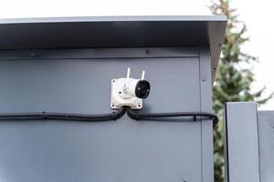 An electrical connector that is securely mounted on a gray enclosure and features associated wiring for enhanced functionality and performance photo