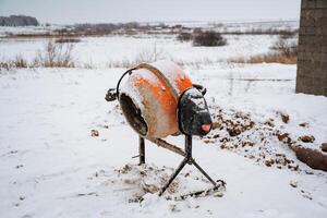 An Uniquely Designed Concrete Mixer That is Shaped Like a Sheep, Set Against the Beautiful Backdrop of a Serene Winter Landscape, Capturing a Truly Whimsical Scene photo