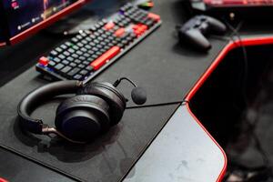 Gaming Setup with Headset, Keyboard, and Controller for Immersive Experience photo