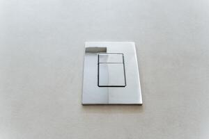 A detailed closeup of a wooden light switch on a wall, highlights its unique label font, craftsmanship, and intricate design, demonstrating quality and attention to detail photo
