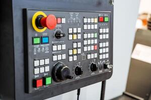 This is an advanced Industrial Control Panel featuring a Keypad and a crucial Emergency Stop Button designed for effective operation photo