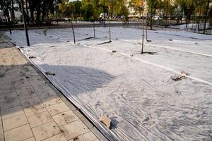 Properly preparing a construction site involves using protective coverings and establishing a sturdy framework to ensure safety and efficiency photo