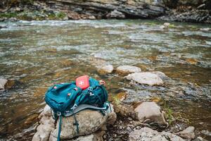 Experience an adventure with Riversides backpack and First Aid Kit in nature. Explore outdoors, enjoy serene landscapes, camping, hiking, and wildlife encounters photo