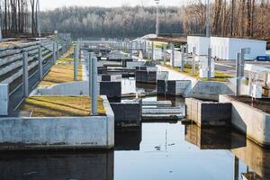 A vast expanse of water showcases an intricate system of numerous locks, which facilitate the movement and control of various boats and ships, exemplifying remarkable engineering prowess photo