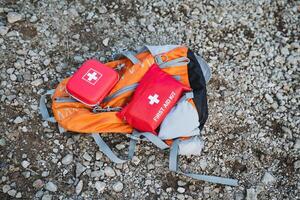 Essential Outdoor Safety Gear Always carry a wellstocked first aid kit in your hiking backpack for emergencies during your adventures photo