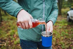 Delighting in Refreshing Beverages While Outdoors A Thrilling Adventure in Nature with Friends and Fun Activities to Enjoy This Summer photo
