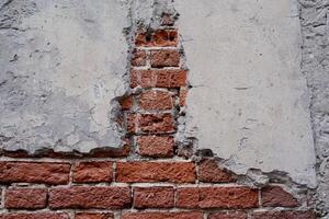 The image captures a weathered brick wall that features a noticeable hole, which emphasizes the intricate texture and remarkable craftsmanship of the brickwork displayed beautifully photo
