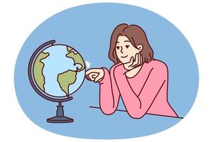 Woman dreams of traveling world looking at globe with planet earth and continents vector