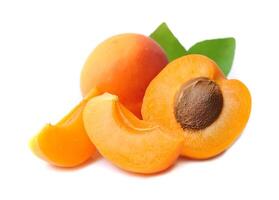 Apricot with leaves on white backgrounds photo