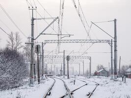 The fork of the railway tracks over the platform photo
