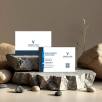 The business card mockup is elegantly displayed on a stone surface psd