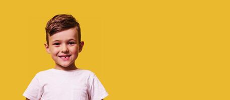 Cute boy without front teeth laughs. Changing teeth and hygiene. Close-up. copy space photo