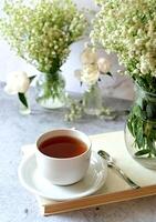 Fresh white gypsophila, piones. An invitation to a holiday. Congratulation.An empty space for text. View from above. photo