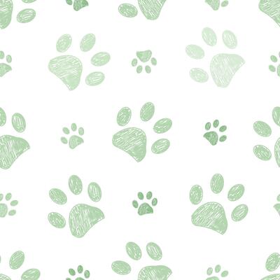 Green doodle paw prints seamless fabric design pattern