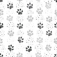 Grey and black paw prints with dots seamless pattern vector