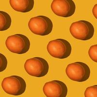 Fresh juicy whole orange on yellow background. Fruit pattern, summer concept. Flat lay Top view. Background with citrus fruits photo