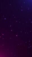 Shiny twinkling pink and blue neon colored stars and glittering particles floating across the frame. Full HD and looping vertical party background animation. video