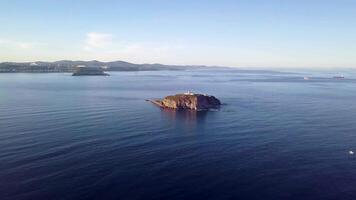 Beautiful drone flight from the rocky Skryplev island with a lighthouse video