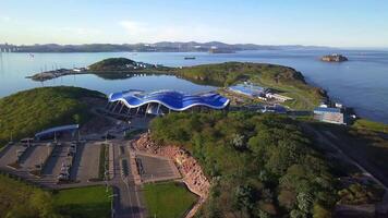 View from a drone of the peninsula on which the Primorsky Oceanarium is located video