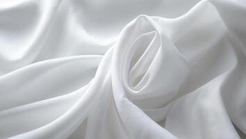 Smooth white fabric with gentle folds and textures. photo