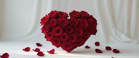 Love Background with bouquet of red roses and heart photo