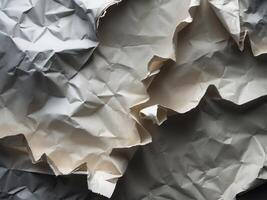 Textured abstract background of crumpled paper photo