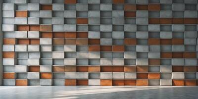 A large room with a wall made of gray and brown blocks photo