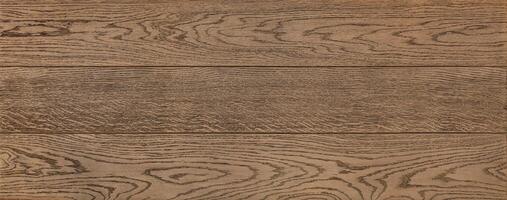 The texture of oak wood planks with a pronounced grain pattern. photo