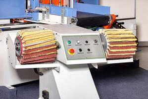 Innovative sanding machine designed for precision wood finishing in a modern workshop setting photo