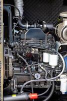 Powerful diesel engine showcased in industrial setting with intricate components photo