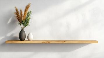 simple wall mounted shelf with decorative plants and vases photo