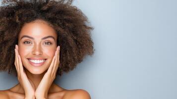 Smiling woman with curly hair expressing joy and confidence photo