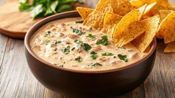 Creamy spinach dip served with crispy tortilla chips, perfect for sharing photo