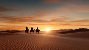 Majestic sunset over Sahara Desert with camels and riders silhouetted photo