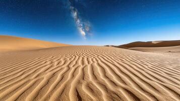 Stunning desert landscape with starry sky and rippled sand dunes photo