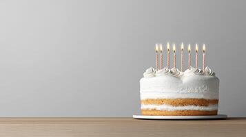 Delicious heart shaped cake with candles, perfect for celebrations photo