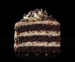 Delicious chocolate cake slice with creamy filling and chocolate shavings photo