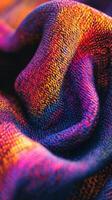 Colorful fabric displaying intricate patterns and textures in close-up view photo
