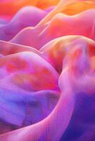 Colorful fabric waves create a vibrant and textured visual display photo