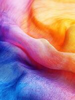Colorful silk fabric showcasing vibrant hues in a smooth texture photo
