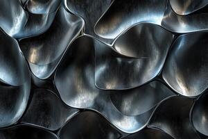 Artistic metal surface featuring flowing, wave-like patterns illuminated softly photo