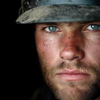 Determined miner showing grit and resilience in a challenging environment photo