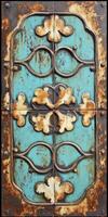 Decorative vintage door with intricate patterns and weathered finish photo