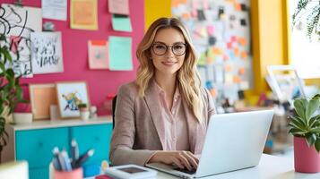 Stylish Caucasian Female Manager Sitting at Desk,Using Laptop Computer in Contemporary Marketing Agency Office Setting photo