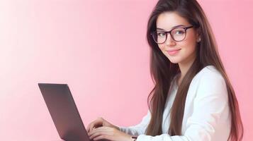 Confident Young Businesswoman or Female Software Engineer Wearing Glasses and Using Laptop Computer in Modern Information Technology Workspace photo