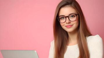 Confident and Focused Young Woman Wearing Eyeglasses and Using Laptop Computer,Representing an Information Technology Specialist,Software Engineer,or Developer in a Professional or Academic Setting. photo